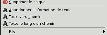 La commande Abandonner l'information de texte parmi les commandes Texte du menu Calque